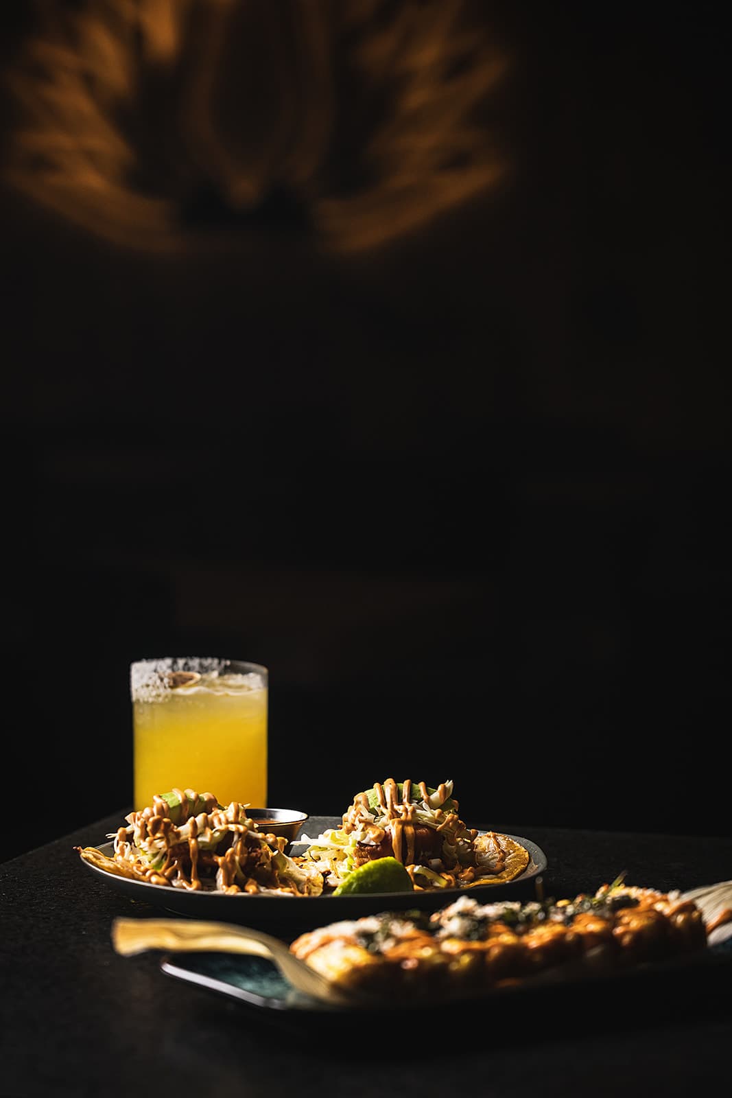 A full Miel de Agave table with tacos, steak and cocktails