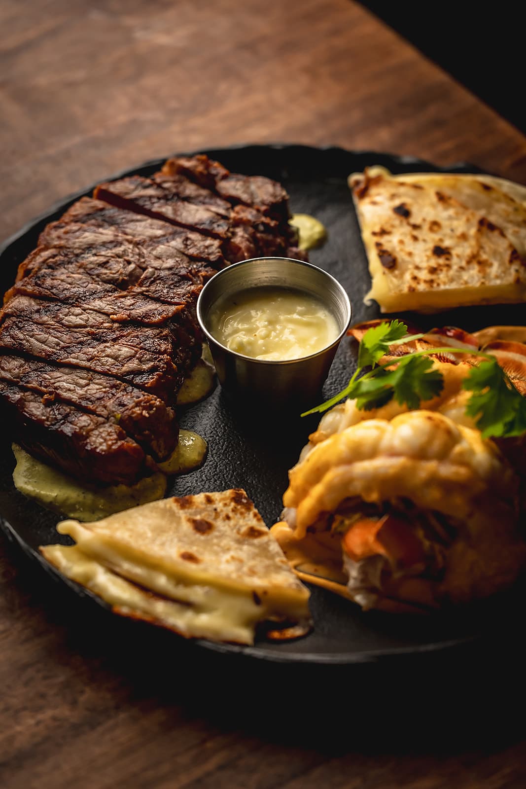 New York steak and lobster with quesadillas
