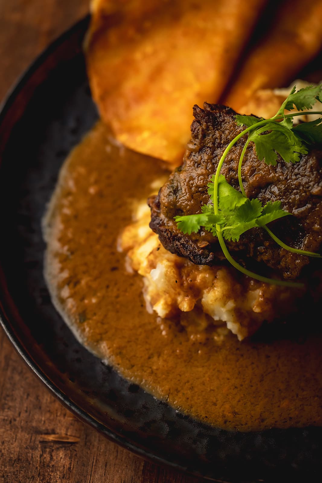 Short rib al Chianti with rich sauce and crisp tortillas