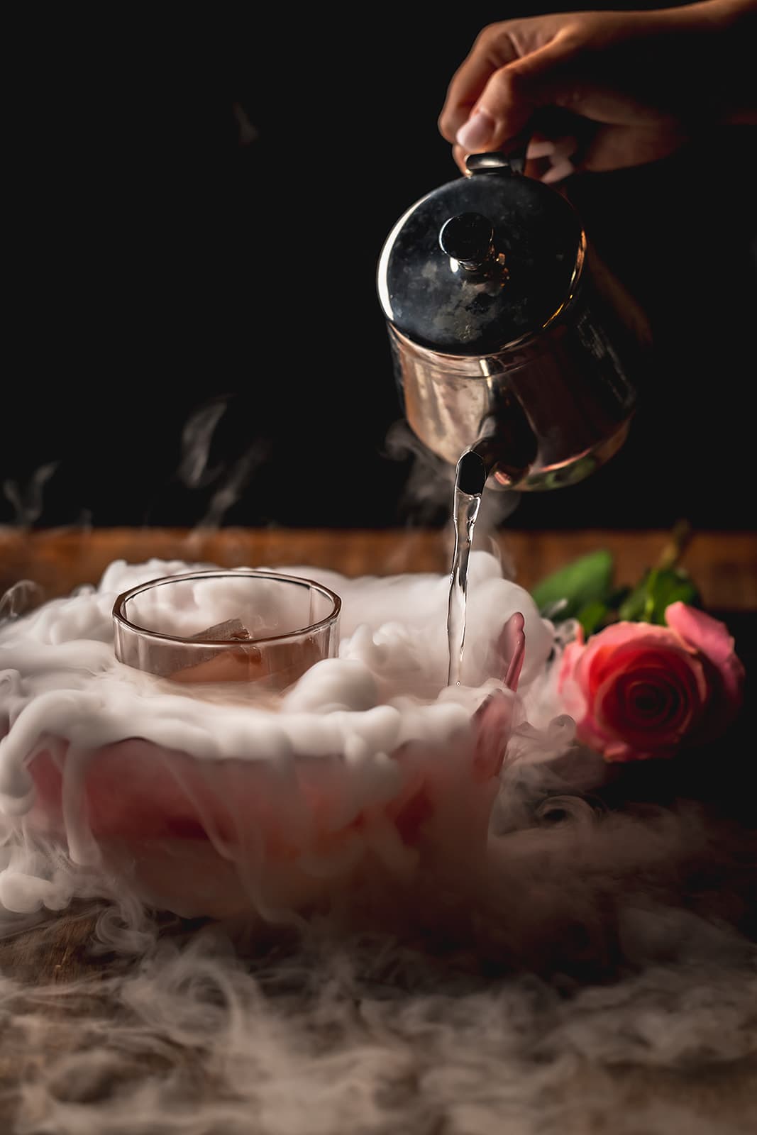 Silk Rose cocktail with rose garnish and tableside presentation
