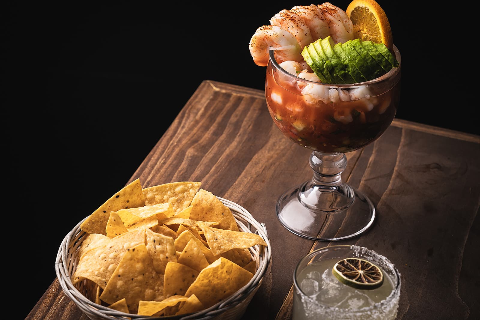 Sonoran shrimp ceviche with chips and a citrus drink